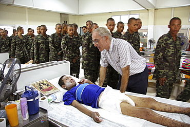 Thailand hiv+ patients in an aids hospice at a buddhist temple in lopburi, being cared for by father mike bassano, a maryknoll priest dedicating his life to serve the sick and needy