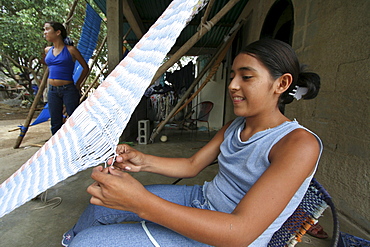 Venezuela girl making hammock, barquisimeto