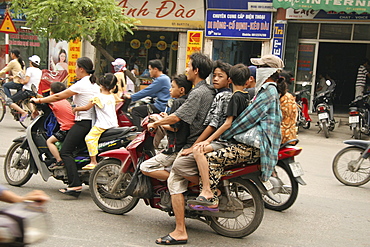 Vietnam street scene in hanoi with heavy traffic, especially bicycles and motorcycles