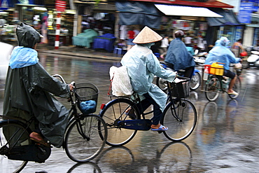 Vietnam street scene in hanoi with heavy traffic, especially bicycles and motorcycles