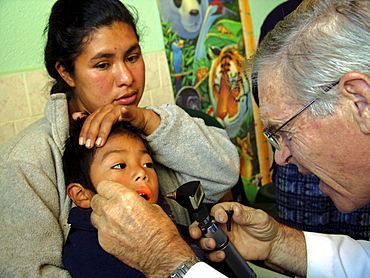 Guatemala doctor will van wisse examining a child at the santa clara la laguna clinic