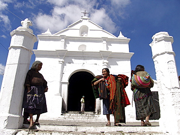 Guatemala women standing in front of a church in chichicastenango