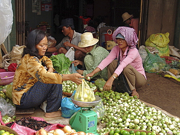 Cambodia woman selling guavas, market, kampong thom town