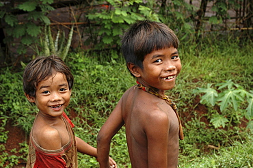 Cambodia boys walking hand-in-hand, kampong cham