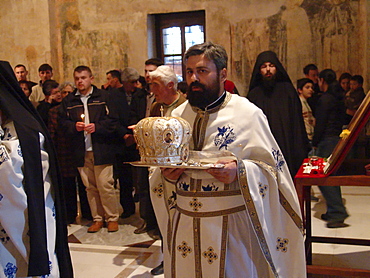 Macedonia (the former yugoslav republic of macedonia, fyrm) carrying the bishops crown. Easter sunday service at saint sofia orthodox church, ohrid. Mass is lead by archbishop timotei