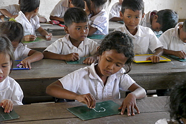 CAMBODIA Village primary school. Inclusive education: CRS works with local education authorities to include children with physical disabilities in regular classrooms. Teachers will receive special training. Ang Soukliang primary school, Prey Neang Puon village, Chum Reas Pen commune, Sam Roang District, Takeo Province. PHOTO by Sean Sprague