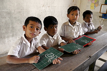 CAMBODIA Village primary school. Inclusive education: CRS works with local education authorities to include children with physical disabilities in regular classrooms. Teachers will receive special training. Ang Soukliang primary school, Prey Neang Puon village, Chum Reas Pen commune, Sam Roang District, Takeo Province. PHOTO by Sean Sprague