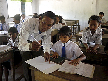 CAMBODIA Village primary school. Inclusive education: CRS works with local education authorities to include children with physical disabilities in regular classrooms. Teachers will receive special training. Ang Soukliang primary school, Prey Neang Puon village, Chum Reas Pen commune, Sam Roang District, Takeo Province. PHOTO by Sean Sprague