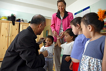 Mongolia catholic bishop wens padilla visiting the verbist center for street children and orphans, ulaan baatar