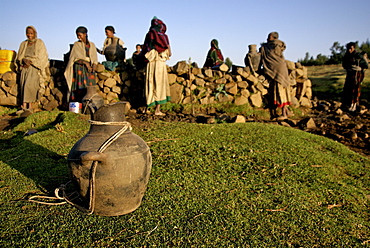 Women fetching water in the hanamerant area ,meket, ethiopia, women fetching water early in the morning. The wells in this area are empty during the dry season,forcing women to walk very long distance to fetch water in the nearest river bed. Ethiopia