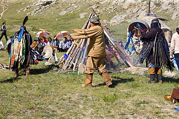 Invocation of the tengir (celestial) forces by means of drumming and dance. Like the sun, fire is a the shamans often wear a ?light-protecting visor? Over their eyes. The radiance of the celestial spirits can be extremely strong, and this protects the onlookers from the blast of light when the celestial spirits enter the body of the shaman. 13th century national park, tov province, mongolia. 13th century national park comprises chinggis khan's giant statue museum and live museum "town from 13 century". The ancient nomadic mini kingdom is located in the distance of 130 km east of ulaanbaatar in area of erdene zuu of tov province. It takes 2 hours driving on paved road. In the live 13th century kingdom one will see and experience the authentic lifestyle of mongols, who were lived in powerful mongol empire?s Period. This place gives you a same feeling that famous traveler marco polo and william rubruck felt once upon time