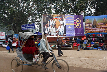 Tens of thousands of buddhist pilgrims from around the world traveled to bodhgaya, a town in northern india, to hear exiled tibetan spiritual leader hh dalai lama give the kalachakra-religious teachings. Pilgrim take rickshaw to the main temple in bodhgaya. Kalachakra initiation in bodhgaya, bihar, india  