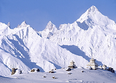 Zanskar, karsha with mountains chortens. Awareness of impermanence change is a primary element in turning mind toward liberation. Because things impermanent, faults be transcended perfections achieved