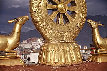 Potala palace seen through dharma chakra wheel from jhkokhang roof. Tibet