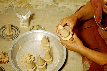 In month of november before full moon a sacred ceremony is held in various monasteries throughout himalayas by traditional healers known as amchis. They call down spiritual deities to bless medicine. Amchis making torma, a ritual food offering. India