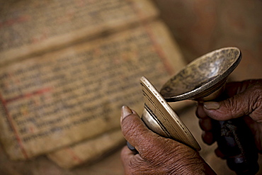 Hindu scripture with cymbals, Bhaktapur, Nepal