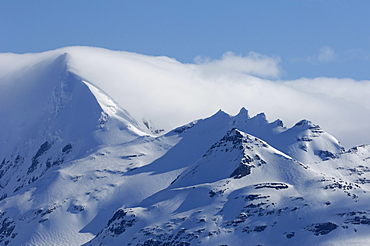 Snow and cloud covered mountain, south georgia