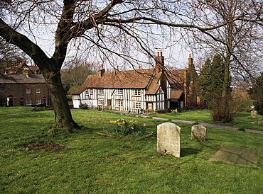 Half timbered cottages in the church graveyard at Old Hatfield, Hertfordshire, England, United Kingdom, Europe