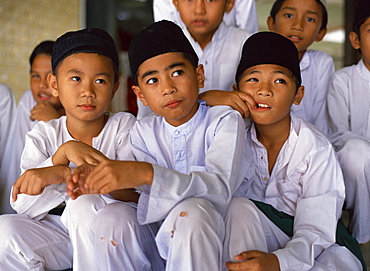 Portrait of a group of schoolboys at a mosque for religious classes in Kota Kinabalu, Sabah, Malaysia, Southeast Asia, Asia