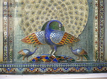 Glass mosaic peacock dating from the late 19th century, in City Palace (Mor Chowk), Udaipur, Rajasthan state, India, Asia