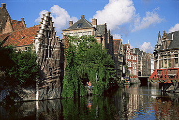 Gabled buildings with distorted facade of bricks, beside old canal, north of the centre of Ghent, Flanders, Belgium, Europe