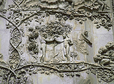 Detail showing Garden of Eden on 14th century marble relief by Lorenzo Maitani and pupiles, beside entrance to cathedral, Orvieto, Umbria, Italy, Europe