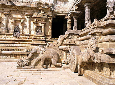 Balustrade, carved elephant and Shiva's chariot at entrance to Airavatesvara Temple built by Chola King Rajaraja II between 1146 and 1172 AD, at Darasuram, near Kumbakonam, Tamil Nadu state, India, Asia