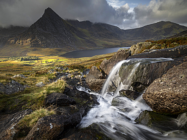 Cascade of Afon Lloer looking towards Tryfan Mountain, Snowdonia National Park