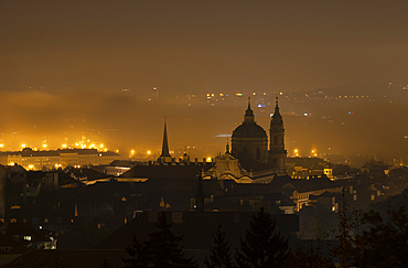 View of skyline including spires of St. Nicholas Church at dawn, Prague, UNESCO, Czech Republic (Czechia)