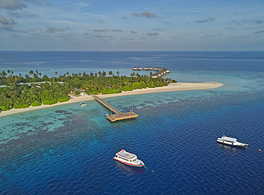 The shoreline and beach of a tropical paradise island in the Maldives: Havodda Island, Gaafu Dhaalu atoll, in the Maldives' far south, in the Indian Ocean.