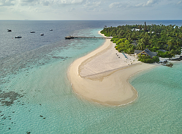 The shoreline and beach of a tropical paradise island in the Maldives: Havodda Island, Gaafu Dhaalu atoll, in the Maldives' far south, in the Indian Ocean.