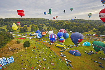 Hot-air balloons taking off from the festival site of the Bristol International Balloon Fiesta, held annually in August, Bristol, England, United Kingdom, Europe