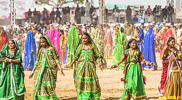 Female dancers at the opening ceremony of the Pushkar Camel Fair, Pushkar, Rajasthan, India, Asia