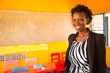 Agnes Mbvoyire, VSO national volunteer working alongside Filipino volunteer Rhea Villarico to improve standards of teaching in nursery schools in eastern Rwanda, Africa