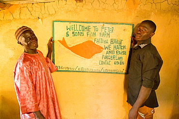 Baba Peter Keita and son Richard Peter, run a fish farm, Nigeria, West Africa, Africa