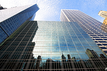 Looking up through skyscrapers, New York, United States of America, North America