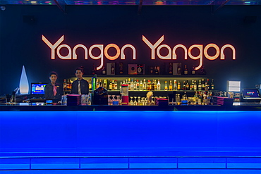 Young people enjoying the nightlife in a modern contemporary bar in Yangon (Rangoon), Myanmar (Burma), Asia