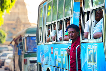 Commuters on a packed city bus, Yangon (Rangoon), Myanmar (Burma), Asia