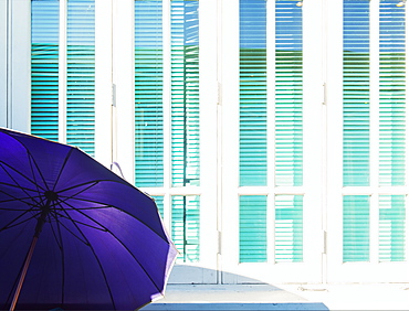 Abstract of purple parasol and cyan window shutters, Naypyitaw, Myanmar (Burma), Asia