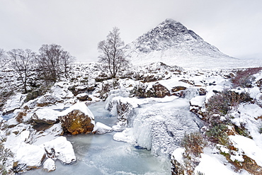 A frozen River Coupall and Buachaille Etive Mor in winter, Glen Etive, Highlands, Scotland, United Kingdom, Europe