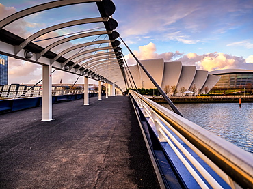 A stunning sunset over Bells Bridge, Glasgow, Scotland, United Kingdom, Europe