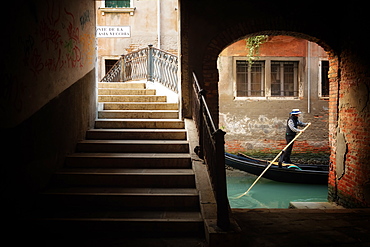 Gondolier by Ponte Della Malvasia Vecchia in Venice, Italy, Europe