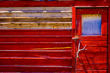 Red door in Polebridge, Montana, United States of America, North America