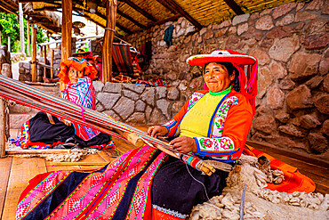 Portrait of Q'eros Quechua woman and loom, Sacred Valley, Peru, South America