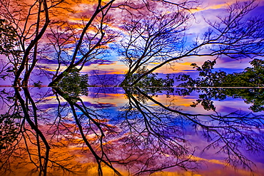 Infinity pool reflection at sunset, Tamarindo, Costa Rica, Central America