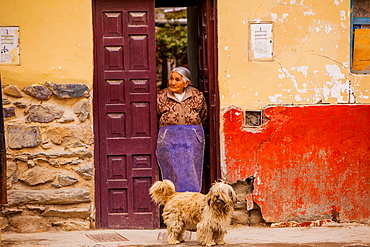 Woman and her dog, Ollantaytambo, Sacred Valley, Peru, South America