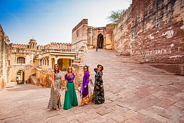 Tourists standing in the main gate of Mehrangarh Fort in Jodhpur, the Blue City, Rajasthan, India, Asia