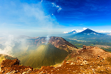 Cresting the peak of Pacaya Volcano in Guatemala City, Guatemala, Central America