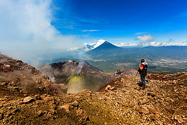 Cresting the peak of Pacaya Volcano in Guatemala City, Guatemala, Central America