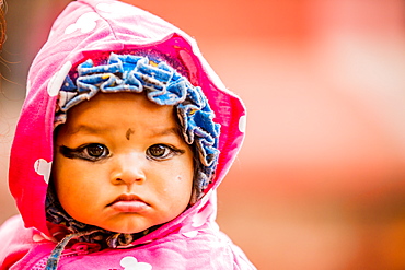 Baby with kohl-painted eyes, Kathmandu, Nepal, Asia